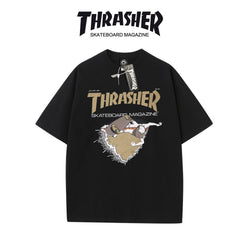 Thrasher Cartoon Skateboarder Print Black Loose Fit Short Sleeve T-Shirt | Fun Streetwear.